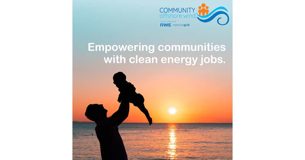 A silhouette of a parent lifting a child against a vibrant sunset over calm waters, highlighting clean energy job empowerment.